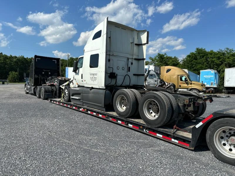 Truck on the road at sunset